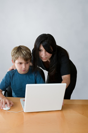 Tutor Helping Boy